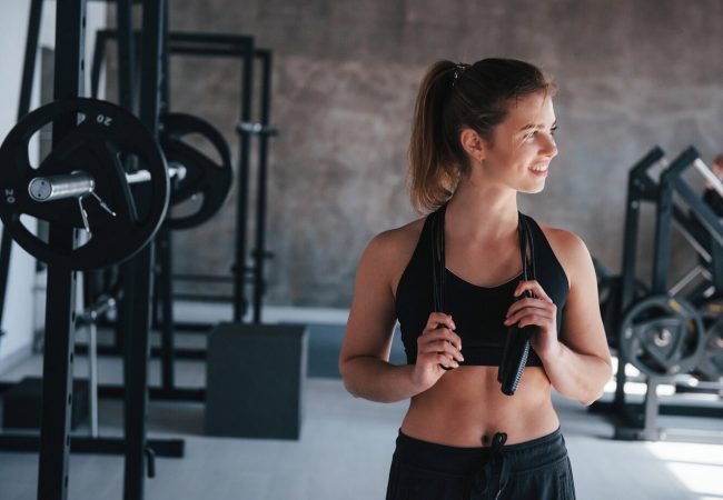 jump-rope-neck-gorgeous-blonde-woman-gym-her-weekend-time_146671-17008